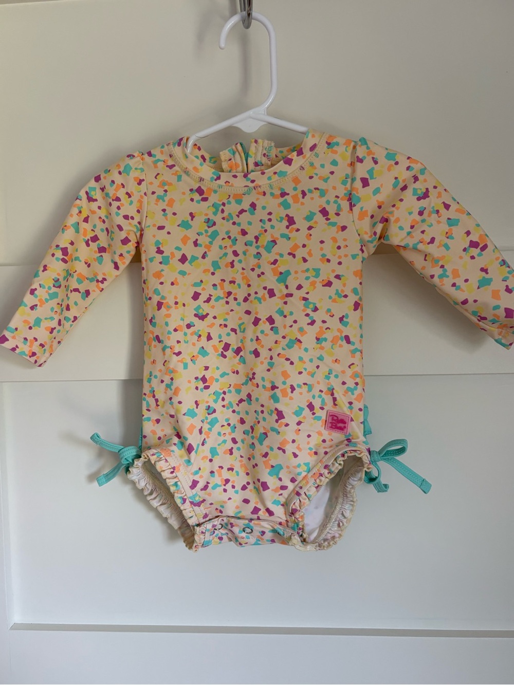 Ruffle Butts Yellow Confetti Long-Sleeve One-Piece with Turquoise Ties